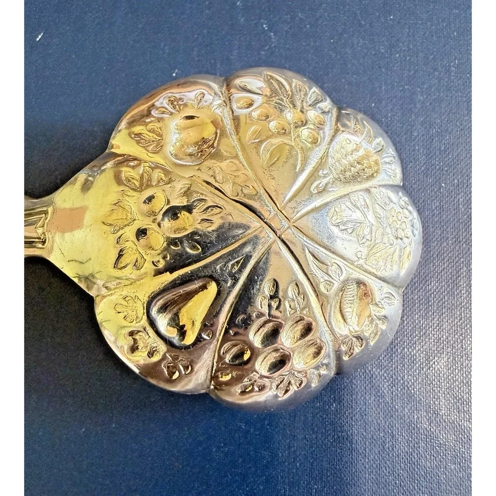 sheffield england silverplated berry ladle shell pattern